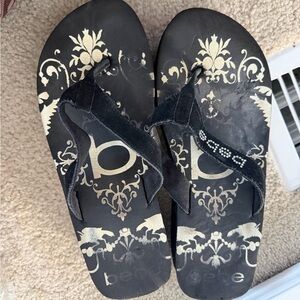 bebe Black and Gold Flip Flops